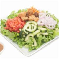 House Salad · Romaine lettuce with shredded carrots, cucumbers, plum tomato, red onion, and multigrain cro...