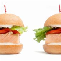 Salmon Jr · Two grilled salmon filet sandwiches with romaine lettuce, plum tomato, and choice of lemon p...
