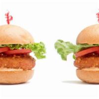 Claw Jr · Two homemade crab cake sandwiches with romaine lettuce, plum tomato and JR’S Fire Sauce.