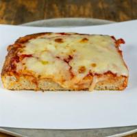 Cataffo'S Sicilian Square · Light airy dough. Tomato and Cheese.