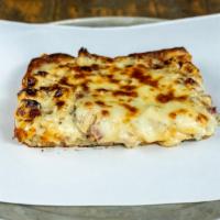 Chicken Bacon Ranch · Grilled chicken. Creamy ranch with loads of bacon. Thin grandma crust.