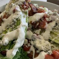 Caesar Salad Grandma · Thin crispy crust topped with crisp romaine lettuce and creamy caesar dressing.