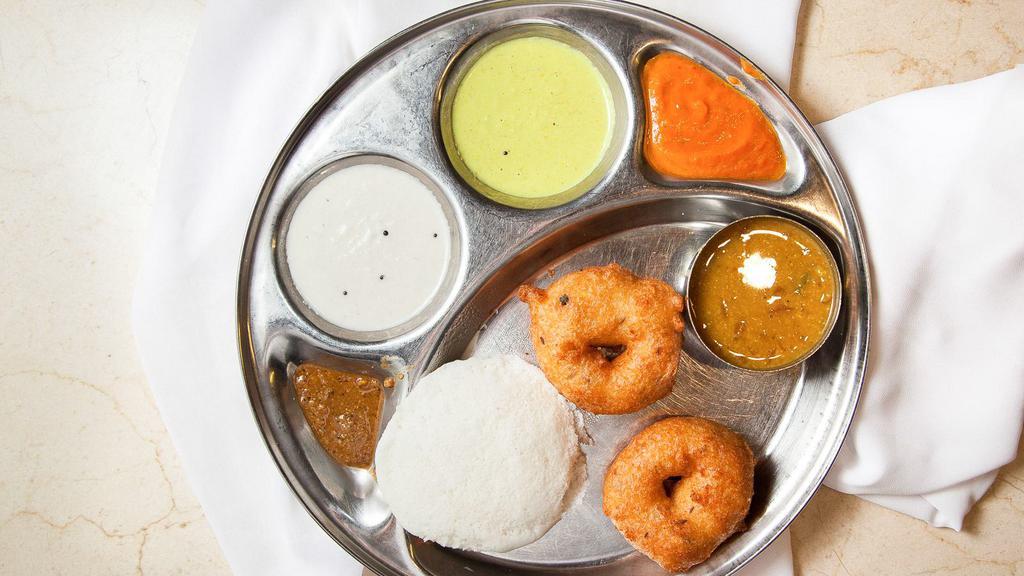 Medhu Vada (2) · Crispy lentil doughnut served with sambar & chutney.