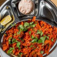 Mixed Vegetable Parotta · Sliced parotta tossed with indian spices and vegetables. served with onion raitha.