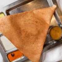 Mysore Masala Dosa · Red chilli chutney spread on thin rice & lentil crepe filled with mashed potatoes and onions