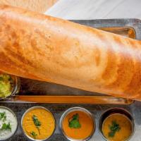 Paper Masala Dosa · Thin lengthy rice & lentil crepe filled with mildly spiced mashed potatoes and onions