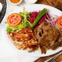 Mix Gyro Plate · Combination of chicken and lamb gyro. Served with bulgur (cracked wheat) or white rice, lett...