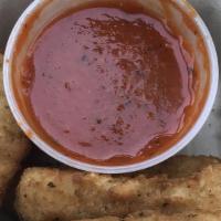 Mozzarella Sticks · Served with marinara sauce.