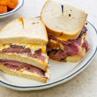 Corned Beef, Pastrami & Salami · Comes dressed with Russian and Cole Slaw