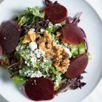 Organic Baby Greens With Beets · Goat cheese, walnuts, beets and white balsamic vinaigrette dressing.