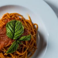 Spaghetti Al Pomodoro E Basilico · Fresh plum tomato sauce.