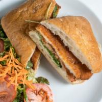 Panini Milanese Lunch Special · Breaded chicken cutlet, arugula, tomato and dressing.