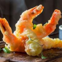Rock Shrimp · deep fried breaded shrimp with special sauce on side.