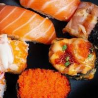 Sushi Deluxe · Chefs picked. Ten piece of assorted sushi and six piece tuna roll.