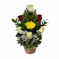 Simple Arrangement 1 · Flower and container may vary depending on the season and availability.
