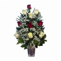 Simple Arrangement 3 · Flower and container may vary depending on the season and availability.