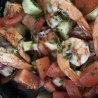 Grilled Jumbo Shrimp Salad · With Cucumber, red onion,  tomatoes, oil & vinegar.