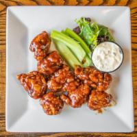 Boneless Buffalo Chicken Chunks · Chunks of chicken tossed in your choice of sauce, served with celery and bleu cheese.