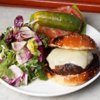 Burger · Grass-fed beef, harissa mayo on sesame brioche.