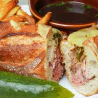 French Dip Sandwich · Shaved prime rib, grilled poblano, caramelized onion, provolone & herbed au jus.