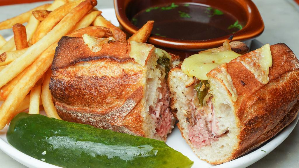 French Dip Sandwich · Shaved prime rib, grilled poblano, caramelized onion, provolone & herbed au jus.