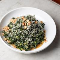 Black Kale Salad · Aged gouda, toasted hazelnuts, garlic croutons & spicy anchovy dressing.