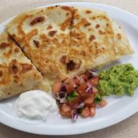 Carne Asada Quesadilla · pico de gallo, sour cream and guacamole