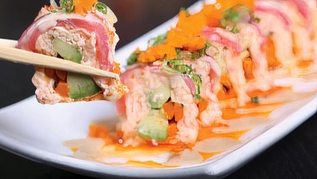 Pink Boy Roll · spicy tuna avocado top w/salmon & crunch spicy mayo