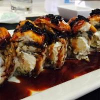 Black Dragon Roll · shrimp tempura avocado cucumber top w/eel & crunch spicy mayo & eel sauce