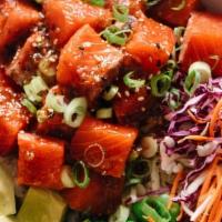 Yuzu Ponzu Salmon Poke · atlantic salmon,  cucumber, sweet onion,pineapple, cilantro, seaweed salad, green onion, ses...
