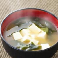 Miso Soup  · Japanese HOT soup. 
Tofu , Scallions, Seaweed, Soy bean Paste.