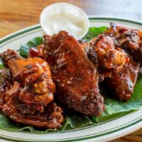 Brooklyn Wings · Sweet and spicy and Alabama drizzle.