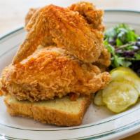 Fried Chicken · Crispy fried. Served with side salad and cornbread.