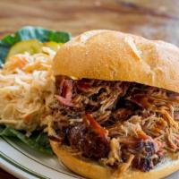 Pork Sandwich · 8hr pulled pork, Joint Smoke BBQ sauce. Served with salad and slaw.