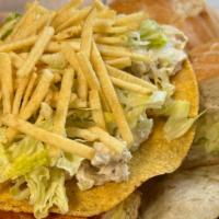 Mexican Tostada · 3 Hard shell tostadas, chicken salad and chipotle sauce.