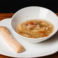 Organic Chicken Noodle · Served with garlic bread.