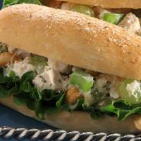 Chicken Salad Sandwich On Hero · With lettuce and tomatoes.