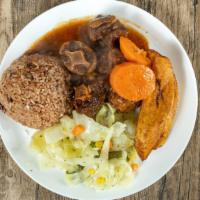 Oxtail · Served with side and rice.
