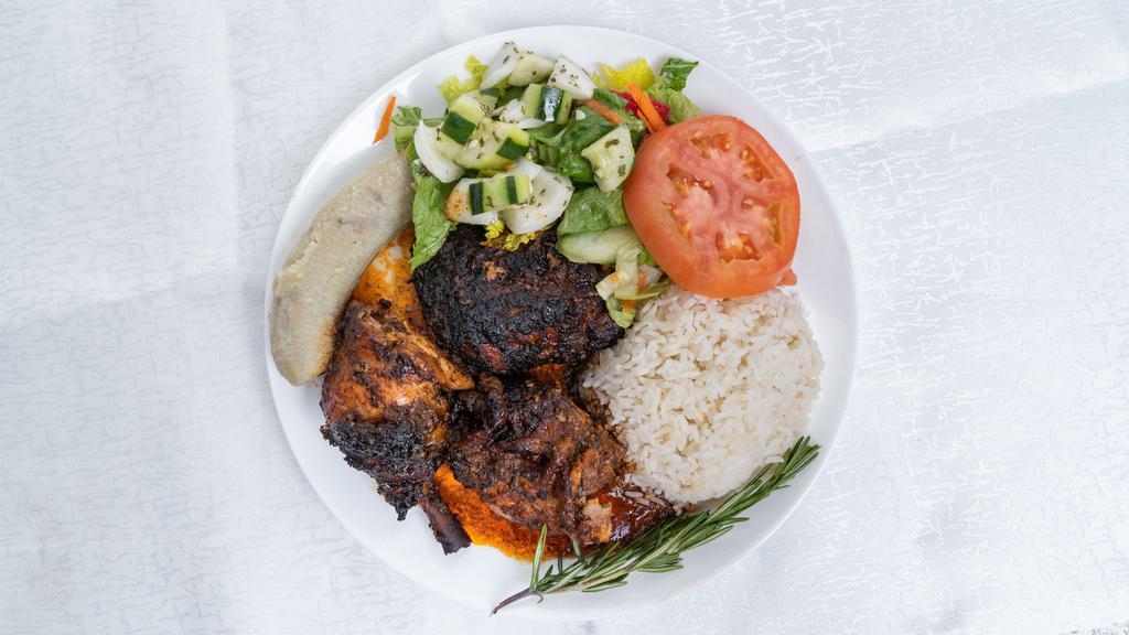 Jerk Chicken · Served with side and rice.