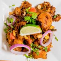Raju Gari Kodi Vepudu (Cashewnut Special Fry) · Well Marinated Boneless Chicken Cooked On The Grill With Cashewnuts And Other Spices.