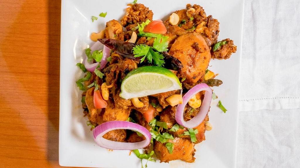 Raju Gari Kodi Vepudu
 · Cashew nut special fry. well marinated boneless chicken cooked on the grill with cashewnuts and other spices.