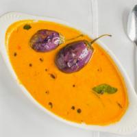 Gutti Vankaya Koora (Eggplant Special) · Eggplant Roasted In A Tandoor And Pureed Cooked With Fresh Tomatoes, Green Peas, Onions, Spi...