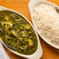 Palak Paneer · Cheese cooked with fresh spinach spices and cream.