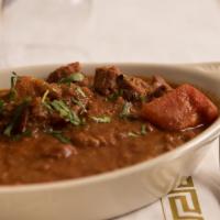Punjabi Lamb Curry (Lamb Vindaloo) · Fresh Lamb chunks cooked with potatoes and home-made sauces.