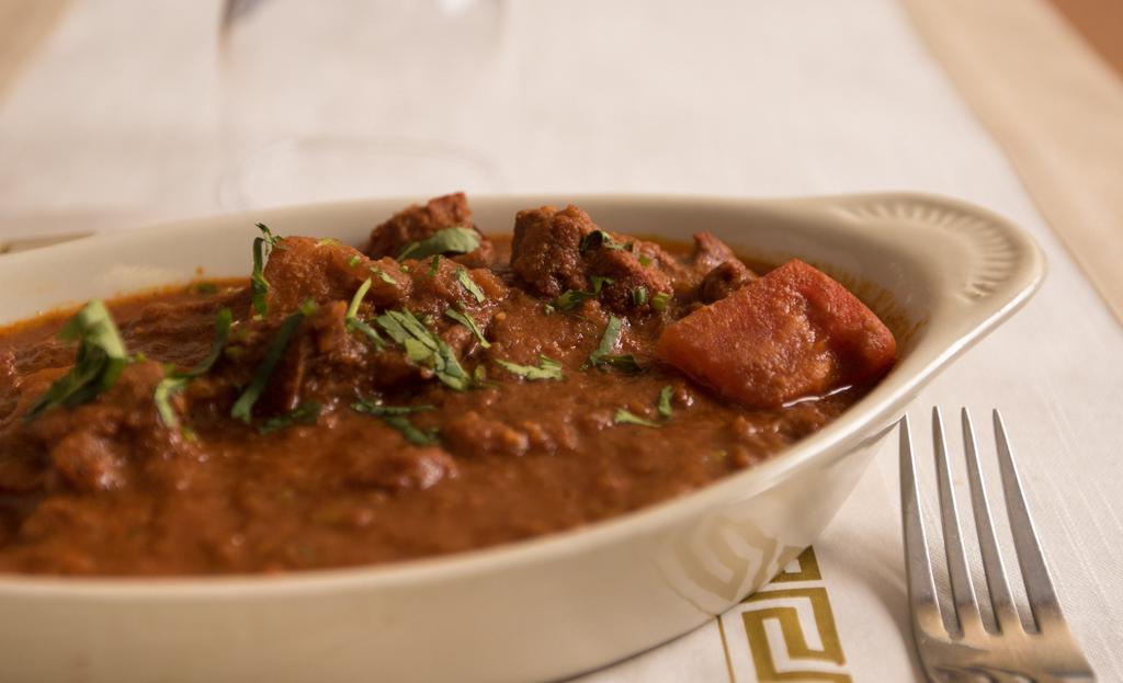 Punjabi Lamb Curry · Vegan. Lamb vindaloo. Lamb curry cooked with potatoes and home made sauces.
