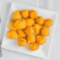 Mysore Bonda · Fried Dumplings Made With Flour, Yogurt, And Spices.