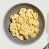 A Tortellini Plan · Fresh tortellini served with your choice of sauce and toppings.