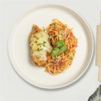 Cheeky Parm Pasta · Fresh pasta in tomato sauce topped with breaded chicken, melted mozzarella cheese, and Parme...