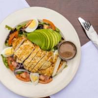 Cobb Salad · Grilled chicken, bacon, hard boiled egg  and avocado, over mixed greens.