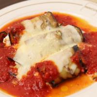 Eggplant Rollatini · thin sliced eggplant battered & pan seared, then rolled with ricotta center and  baked to pe...